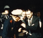 Oswald being taken into custody